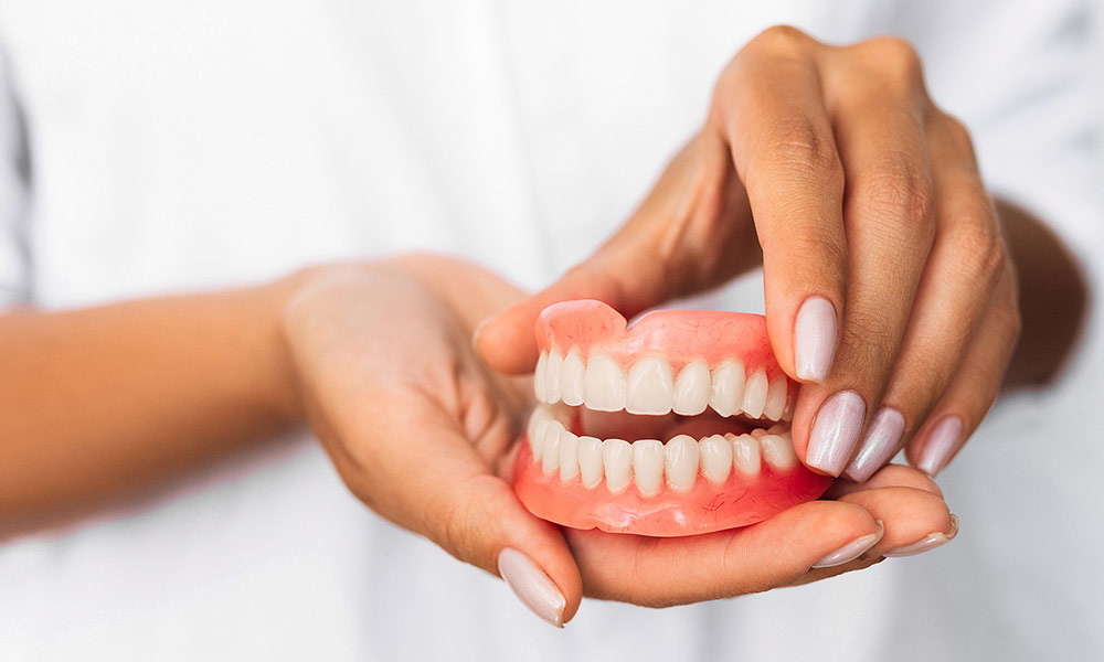 Dentures are a tried and tested way to replace missing teeth and treatment is non-invasive and cost-effective.